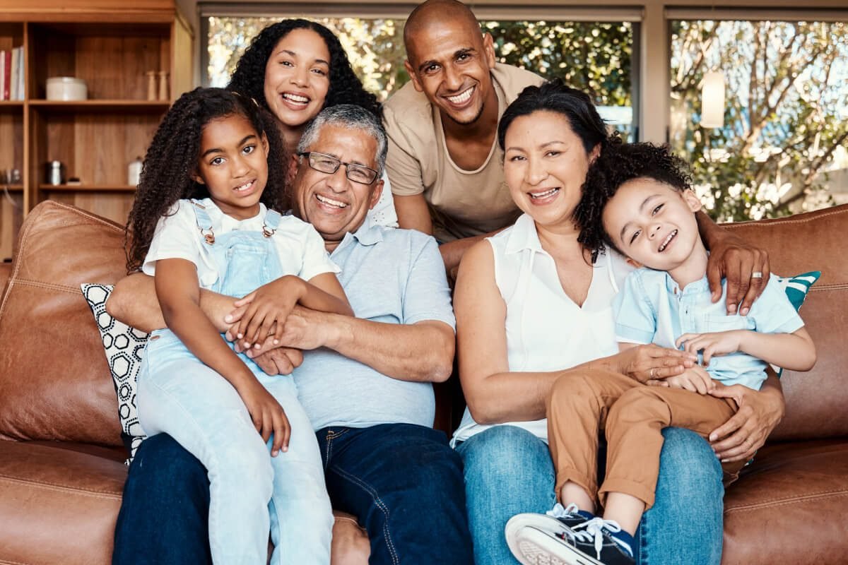 parents-kids-and-grandparents-on-sofa-for-portrai-PGEWGLZ.jpg