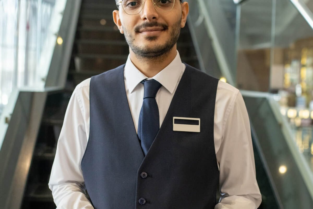 young-hotel-manager-with-tablet-PAA54BC.jpg